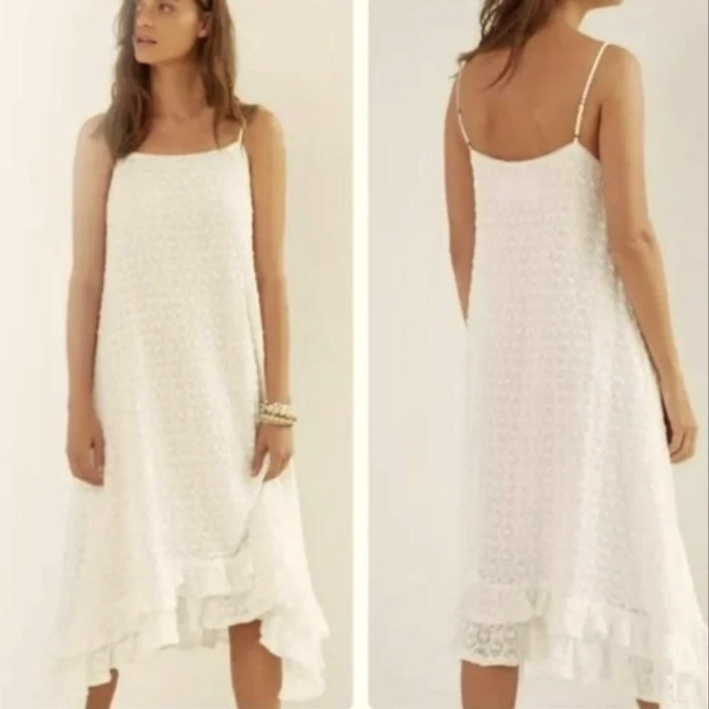 Anthropolgie crochet, spaghetti strap dress with an asymmetricle ruffled hem